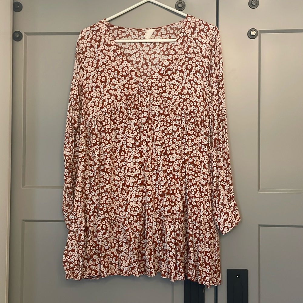 Small long-sleeved mini dress. Unlined